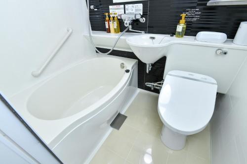 Standard Twin Room room in Sanco Inn Nagoya Shinkansen-guchi Annex