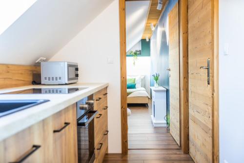 Forest oasis - mountain attic in High Tatras in Велка Ломника