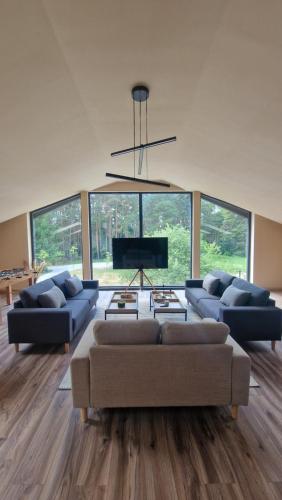 Общ салон/телевизионна зона, Nomad Lodge in Ruginești
