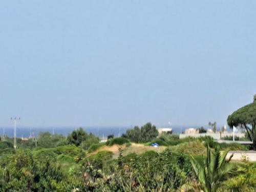 Garden apartment in Neot Golf, with sea view in 凯撒利亚