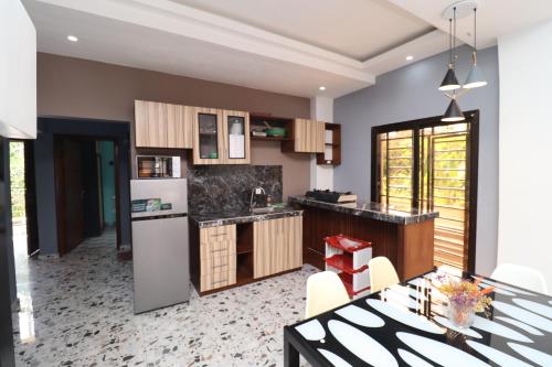 AfriqPnB RF Appart 3-chambres situe a Kribi Bebambwe avec Piscine in Kribi