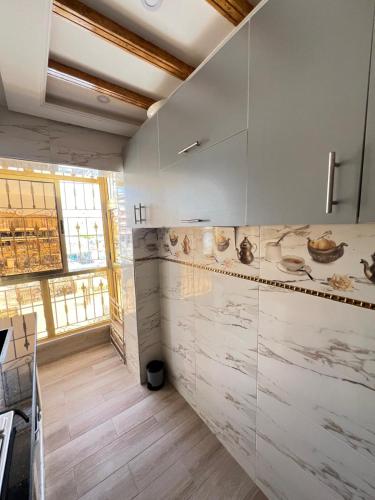 kuhinja, Dar Bahia - appartement économique (Dar Bahia - appartement economique) in Mghogha