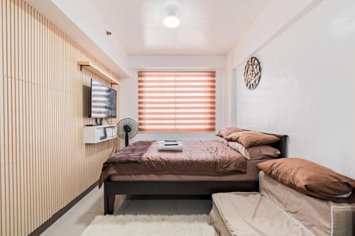 Prime Studio Unit at Robinson Magnolia 5 mins Walk to Mall-Netflix-KTV-WiFi, Manila