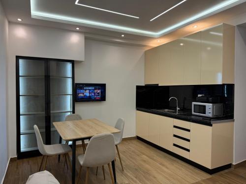 Two-Bedroom Deluxe Apartment with Balcony room in Kanaj Rooms and Apartments