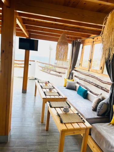 Shared lounge/TV area, Moonlight Surf Hostel in Taghazout
