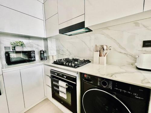 Soft Modernity 1br Haven With Parking, Gym & Pool!, Dubai (photo 10)