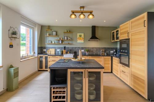 virtuve, La Richaumoise - Maison avec grand jardin in Puisieux-et-Clanlieu
