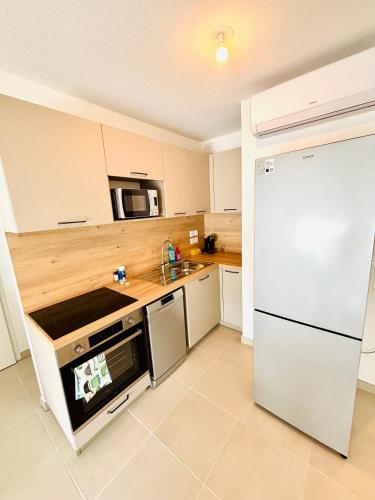 LE 209, 3min à pieds de la Plage, tout confort, Terrasse, 2 Parking privée, Vias (fotografie 8)