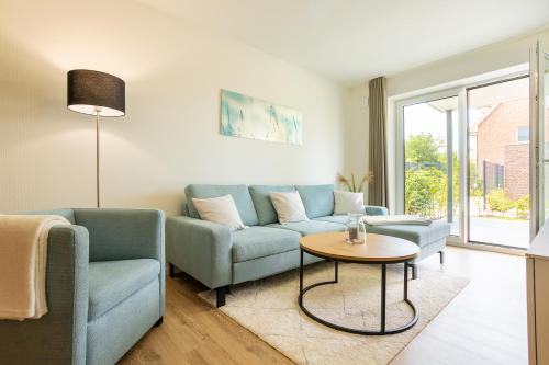 Dorumer Seestern - Ferienwohnung mit Terrasse und Sauna