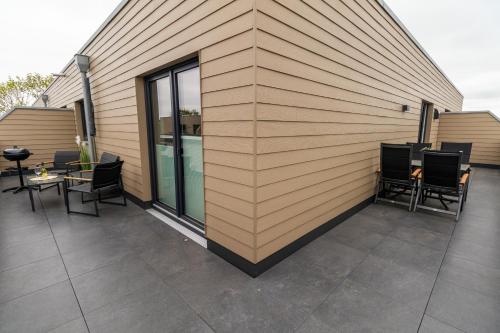 Lotta – Familienfreundliche Ferienwohnung mit Sauna & nah am Strand!, Tossens (foto 8)