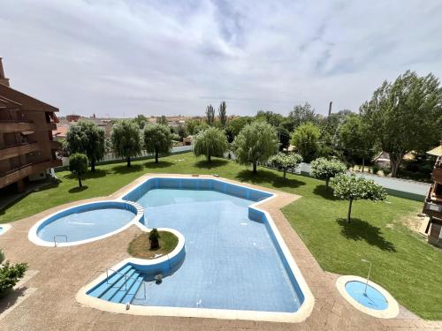 Peldbaseins, BaruHaus duplex piscina y parking Villamañán 2 (BaruHaus duplex piscina y parking Villamanan 2) in Valencia De Don Juan
