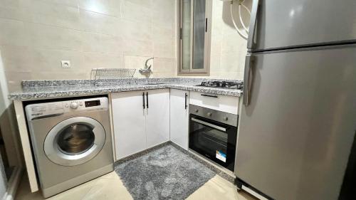 T1 App moderne 2 chambres, a 10 min de Hay Riad, Accès Facile (T1 App moderne 2 chambres, a 10 min de Hay Riad, Acces Facile) in Temara