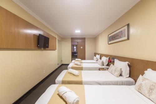 Executive Quadruple room in Amuarama Hotel