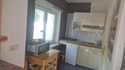 Konyha, WOHLFÜHLOASE - Zimmer, Appartment - im Herzen STARNBERGS (WOHLFUHLOASE - Zimmer, Appartment - im Herzen STARNBERGS) in Starnberg