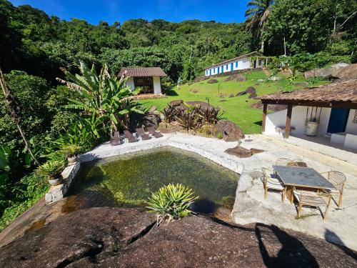 Úszómedence, Villa com piscina, loft e 5 suítes - Praia do Léo (Villa com piscina, loft e 5 suites - Praia do Leo) in Praia do Puruba