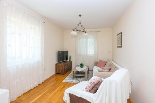 Two-Bedroom Apartment with Terrace room in Family-friendly apartments with swimming pool Biograd na Moru Biograd - 23754