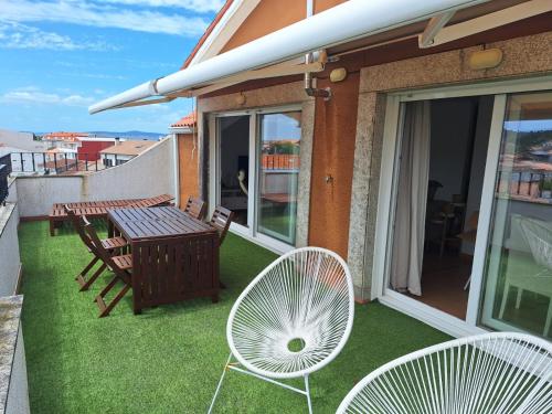 A1 Ático O Grove Centro con terraza y parking