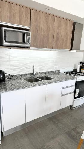 주방, DM SUITE Cómoda y moderna unidad para estancias inolvidables (DM SUITE Comoda y moderna unidad para estancias inolvidables) in 바리오 파르케 루로