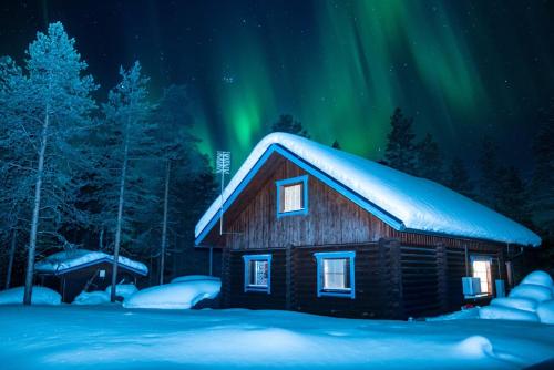 Cozy Log Cabin with Sauna and Wifi in มิวนิโอ