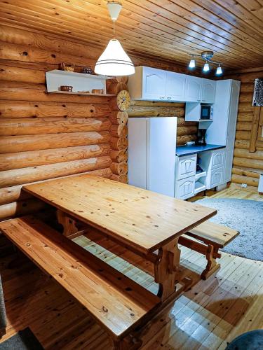 Cozy Log Cabin with Sauna and Wifi in มิวนิโอ