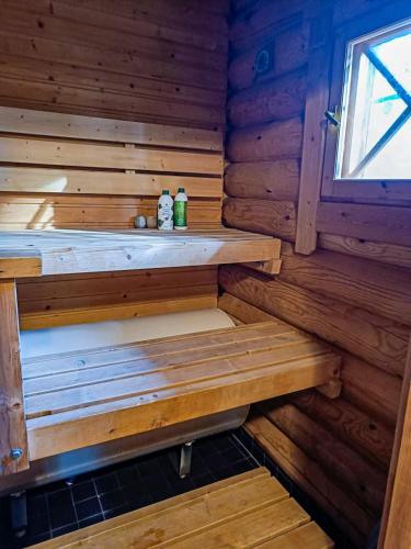 Cozy Log Cabin with Sauna and Wifi in มิวนิโอ