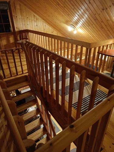 Cozy Log Cabin with Sauna and Wifi in มิวนิโอ