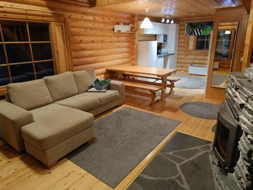 Cozy Log Cabin with Sauna and Wifi in มิวนิโอ