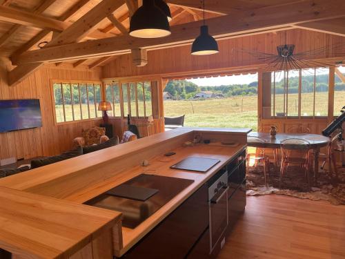 Maison bois Lesbats in Mezos ciems