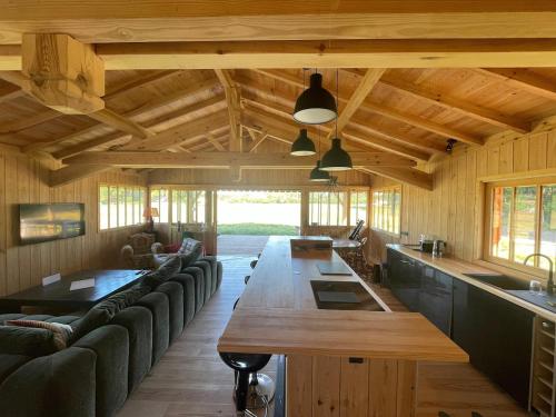 Maison bois Lesbats in Mezos ciems