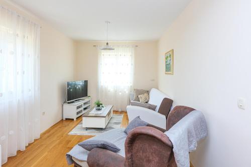 Two-Bedroom Apartment with Terrace room in Family-friendly apartments with swimming pool Biograd na Moru Biograd - 23754