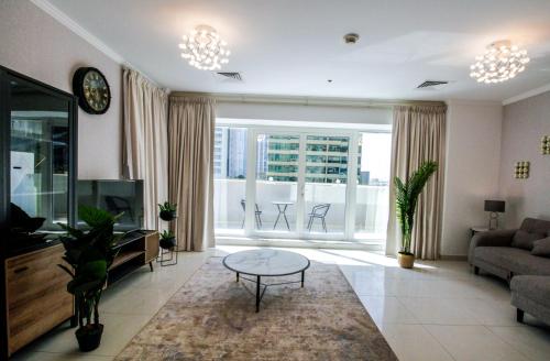 Yogi – 1BR JLT | Wraparound Balcony & Terrace - image 14