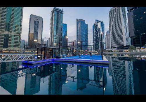Yogi – 1BR JLT | Wraparound Balcony & Terrace