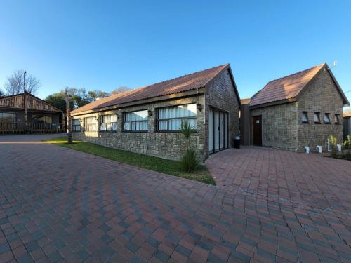 The Log Cabin Apartments Hotel in Standerton