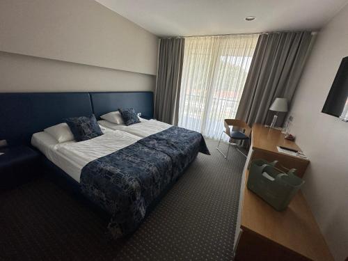 Double Room with Balcony (2 Adults + 1 Child)