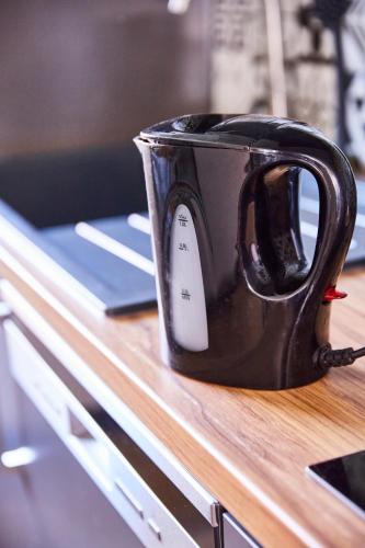 TH 103 Appartement F2 à Thann 1 à 3 personnes (TH 103 Appartement F2 a Thann 1 a 3 personnes) in Thanas