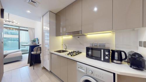 Vacationer Holiday Homes I Peaceful Studio l Modern Gym & Pool Facilities l Close to Downtown Dubai, Dubái (foto 6)