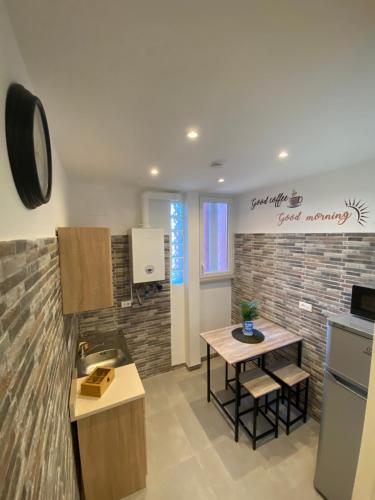 ローマ BERNOCCHI ROMA APARTMENT, difronte metropolitana 3つ星 ゲストハウス ロビー