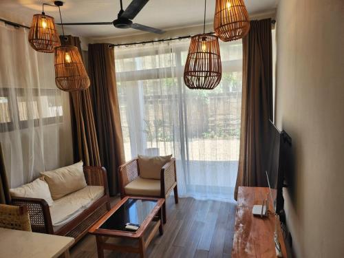 Afro breeze beach apartment 3 in Nyanyanu