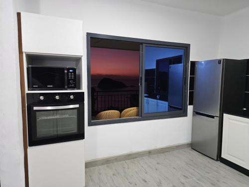 T3 tout confort avec vue panoramique in 치코니