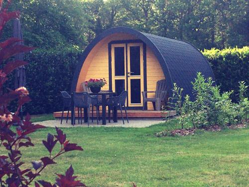 Luxe woodlodge in bosrijke omgeving incl eigen douche en keuken