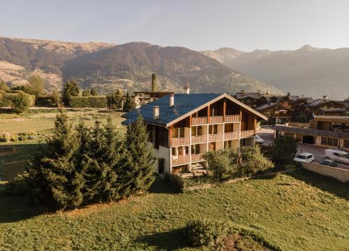 Location g�te, chambres d'hotes La Maison H&ocirc;tel Les Peupliers dans le d�partement Savoie 73