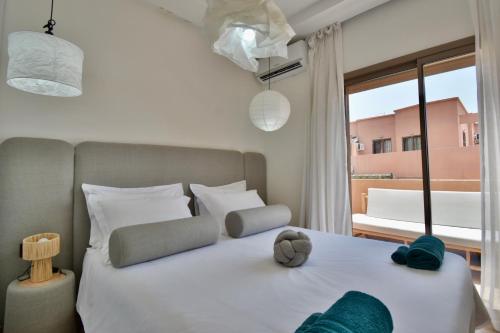 Appartement familial avec piscine à Marrakech - Tap to explore photos