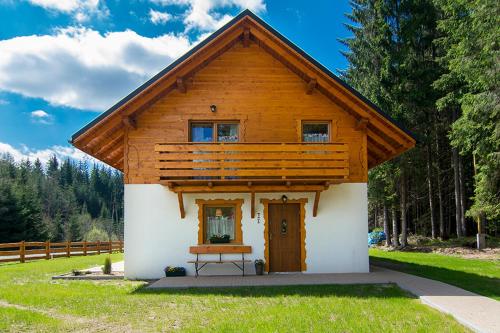 Alpejska Wioska - apartamenty i pokoje z aneksem kuchennym