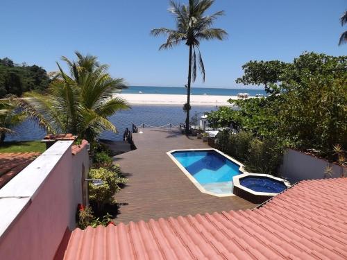 Casa na Barra do Una, à beira do Rio Una e frente a Praia