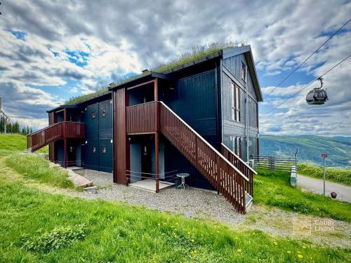 Ski-In Out apt Hafjell - Sauna and Stunning Views in Oyer