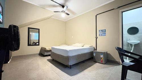 Suite 04 - Hospedagem Guaruja near Flor De Pitanga Confeitaria