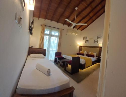 Triple Room with Balcony room in Hotel Kamrel Sigiriya