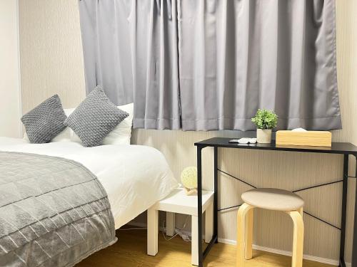Ikebukuro Area 2F3 KamiikeApartment, Токио (фото 8)