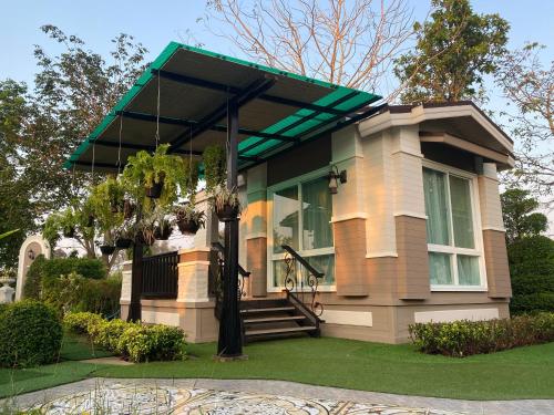 บ้านนิมิตรีสอร์ท in Pak Thong Chai