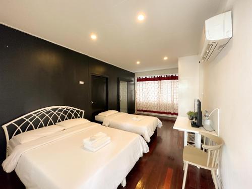 โรงแรมไวท์ลอดจ์ กรุงเทพ (White Lodge Hotel Bangkok) near โรงเรียนเตรียมอุดมศึกษา